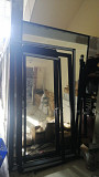 Supply and Fabrication of 6965 framed folding glass doors Ajman