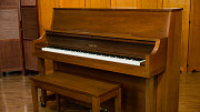 Yamaha studio piano from Denver