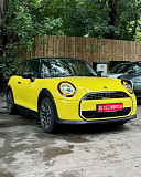 A yellow mini Cooper from Trenton