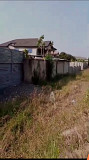 A well fenced and gated 100x80 plot of land for sale Accra