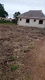 Setback 2 bedroom bungalow on a full plot facing the road Lagos