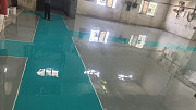 Industrial Epoxy Flooring Services with Yellow Safety Marking from Pune