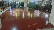 Industrial Epoxy Flooring Services with Yellow Safety Marking from Pune