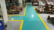 Industrial Epoxy Flooring Services with Yellow Safety Marking from Pune