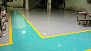 Industrial Epoxy Flooring Services with Yellow Safety Marking from Pune