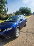 A NEAT BLUE NISSAN ROGUE SPORT, 2019 MODEL (NISSAN QASHQAI) from Austin