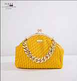 Braided chain clause evening bags from Lagos