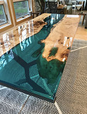 Turquoise resin river dining table from Lawrence